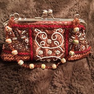 Copper colored evening bag. Never used.